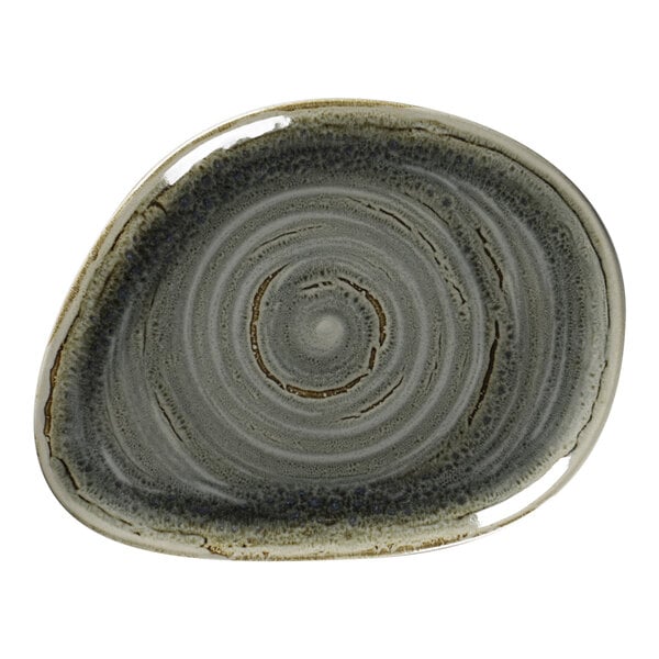 A close-up of a peridot RAK Porcelain flat organic plate with a spiral design.