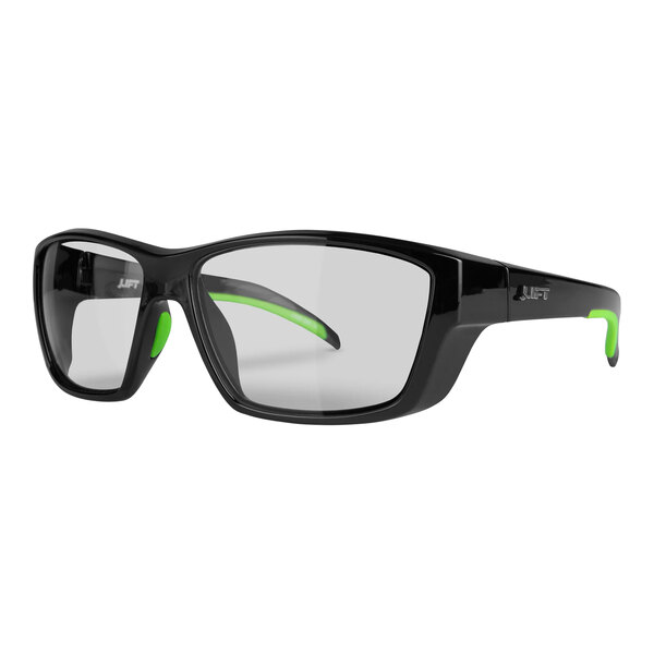 A pair of black safety glasses with a clear lens and green accents.