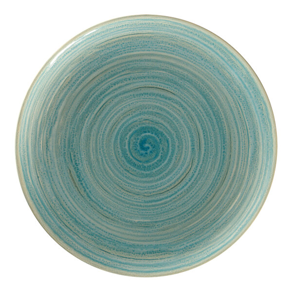 A blue RAK Porcelain flat coupe plate with a spiral pattern in the center.