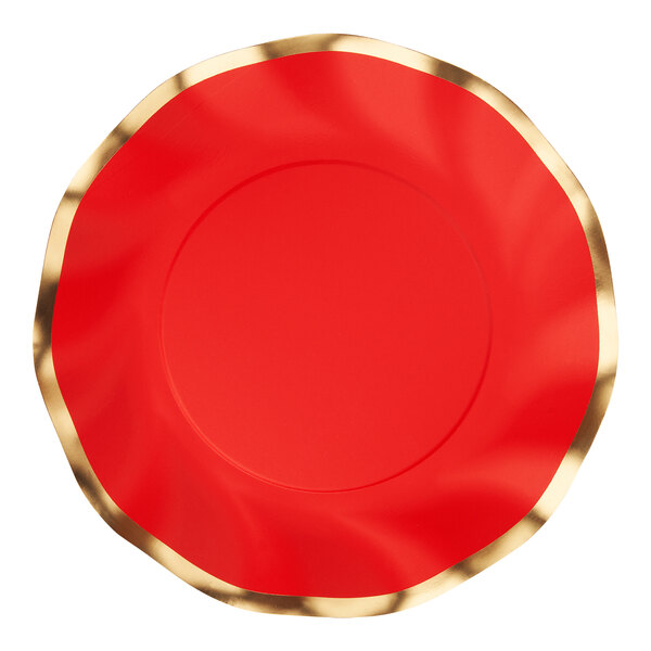 A Sophistiplate red and gold wavy paper salad plate with a gold rim.