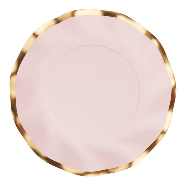 A close-up of a Sophistiplate pink and gold wavy paper salad plate.