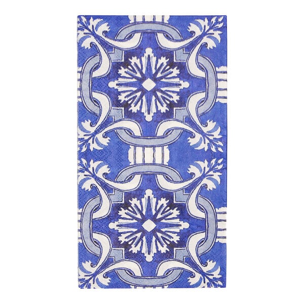 A blue and white Moroccan Nights paper guest towel on a table.