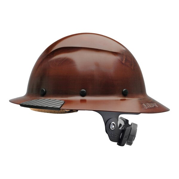 A brown Lift Safety Dax hard hat with a black strap.