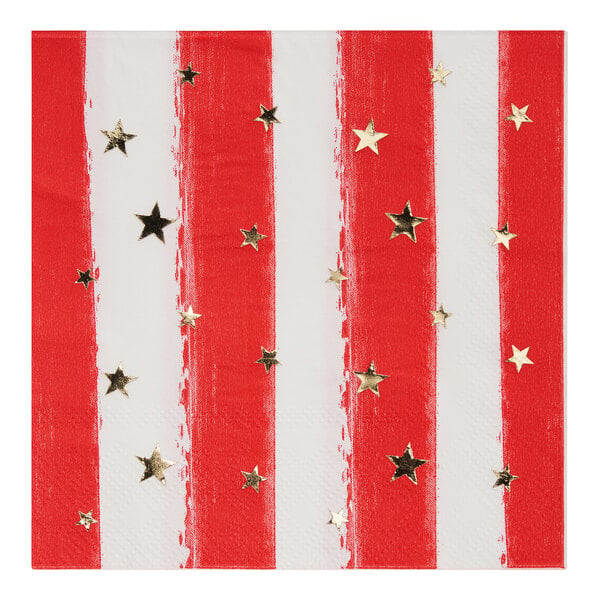 A white paper cocktail napkin with red and white striped edges and gold stars.