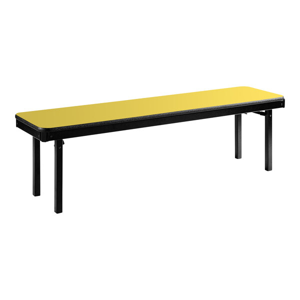 A long yellow bench with black legs.