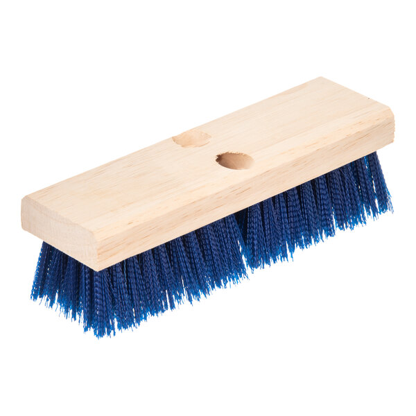 A Carlisle blue deck scrub brush with a wooden handle.