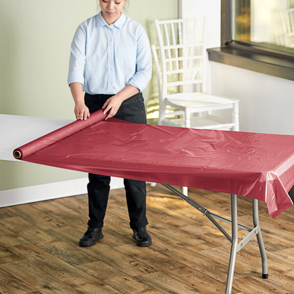 Choice 40" x 100' Burgundy Plastic Table Cover Roll