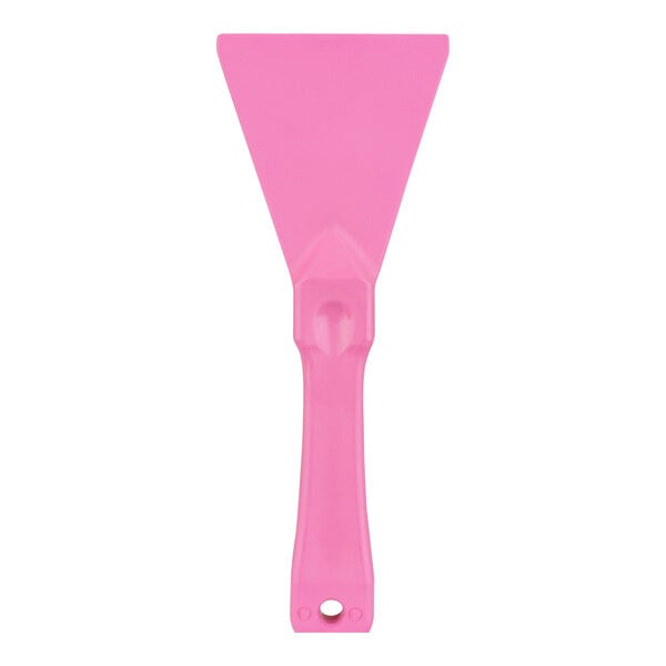 A pink plastic Carlisle Sparta handheld scraper.