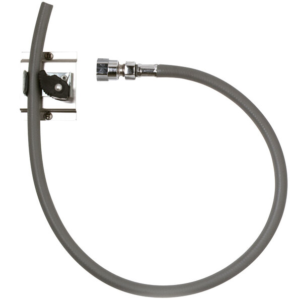 A grey flexible hose with a metal connector attached to a metal bracket.