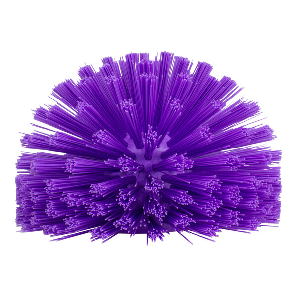 A purple round Carlisle brush with many long bristles.