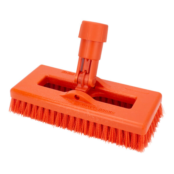 An orange plastic Carlisle Sparta swivel scrub brush.