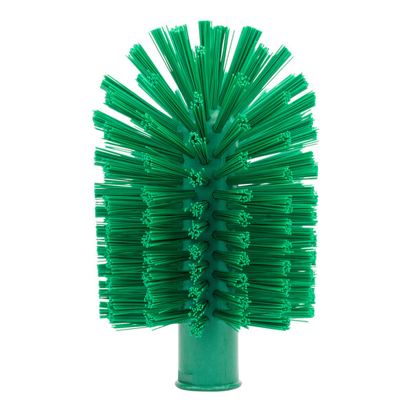 A green Carlisle Sparta pipe and valve brush with bristles.