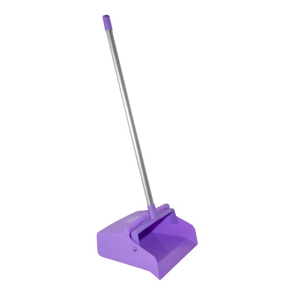 A purple Carlisle dustpan with a long silver metal handle.