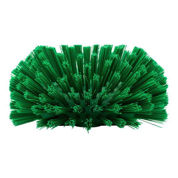 A Carlisle green plastic brush with long green bristles.