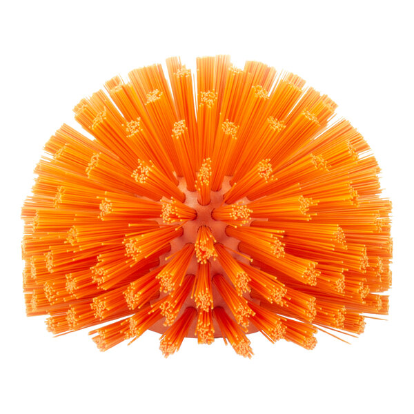 A round orange Carlisle brush with many orange bristles.