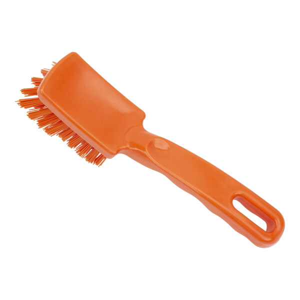 A Carlisle Sparta orange detail brush with a handle.