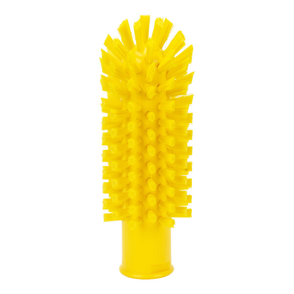 A yellow Carlisle Sparta pipe and valve brush with bristles.