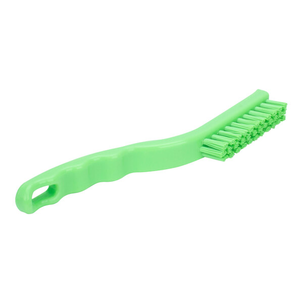 A green brush with a handle and polyester bristles.