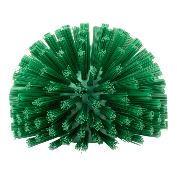 A green round Carlisle Sparta pipe and valve brush with long bristles.