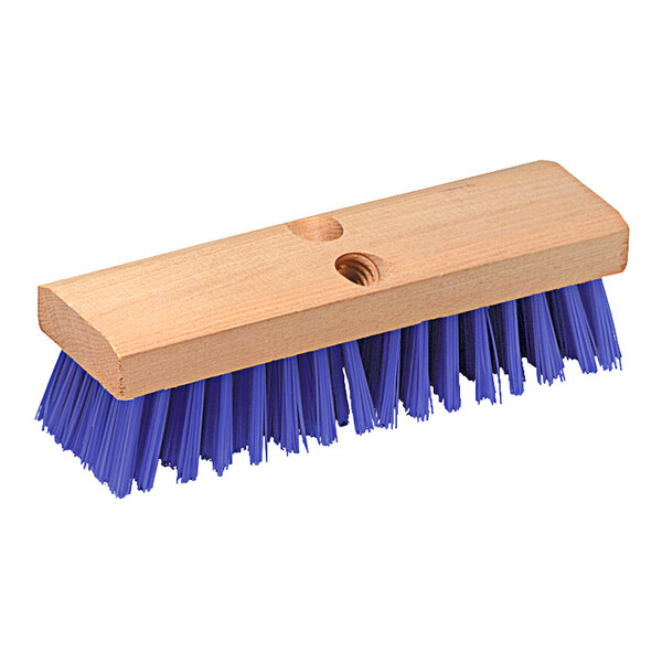 A Carlisle blue deck scrub brush with a wooden handle.
