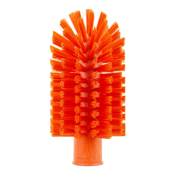 A close-up of the Carlisle Sparta orange pipe and valve brush with bristles.