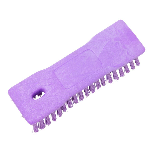 A purple Carlisle Sparta handheld scrub brush with bristles.