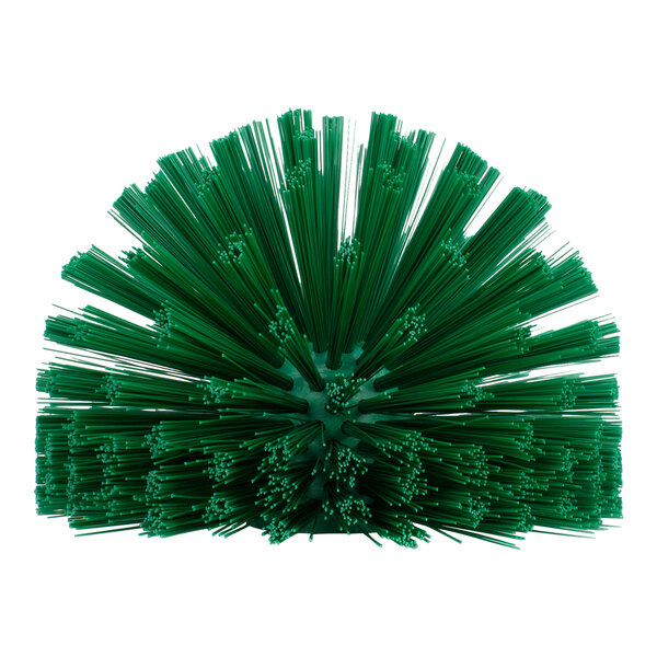 A Carlisle Sparta green pipe and valve brush with long green bristles.