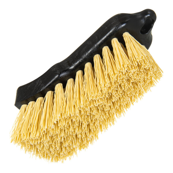 A Carlisle Sparta curved back hand scrub utility and pot brush with yellow and black bristles.