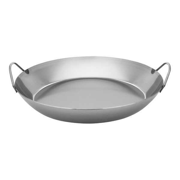 A black carbon steel Matfer Bourgeat paella pan with handles.