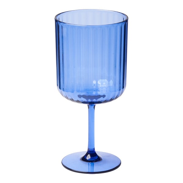 A Sophistiplate cobalt blue plastic wine glass with a stem.