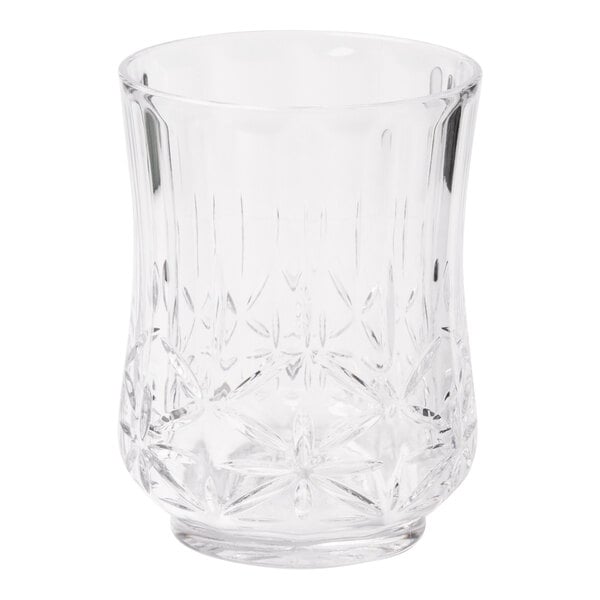 A clear plastic tumbler with a diamond pattern.