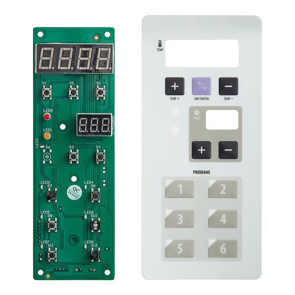 The white upper heat control panel for an Estella DPC18P with a green circuit board and digital display.