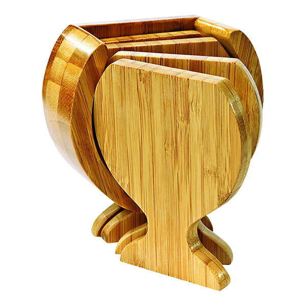 A wooden container with Franmara bamboo coasters stacked inside.