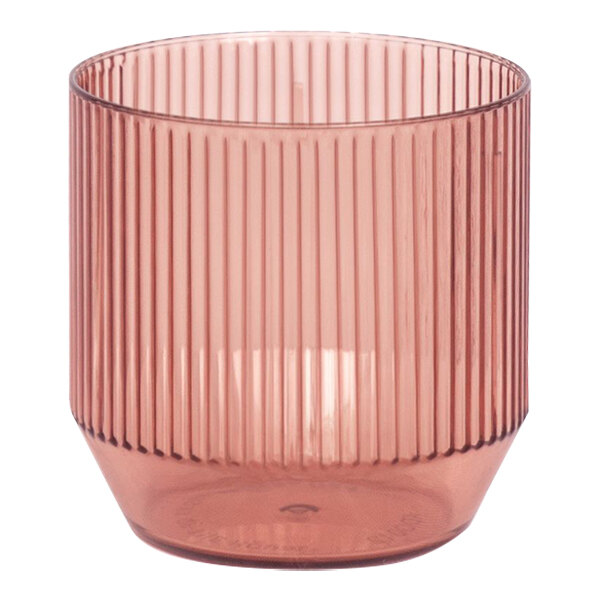A Front of the House Gatsby pink plastic rocks glass with ribbed design on bottom.