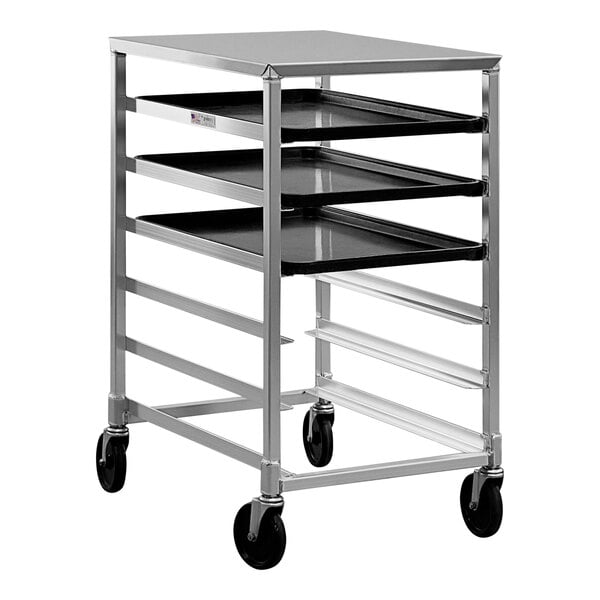 A metal cart with black trays.