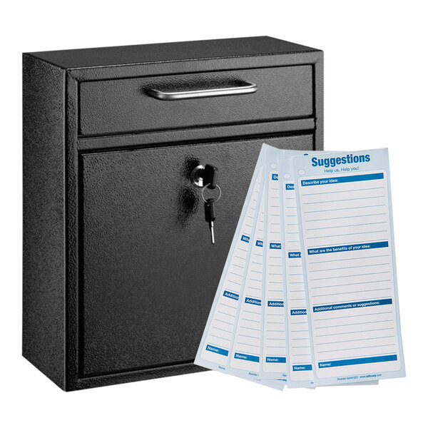 A black steel wall mounted drop box with a key and suggestion cards inside.