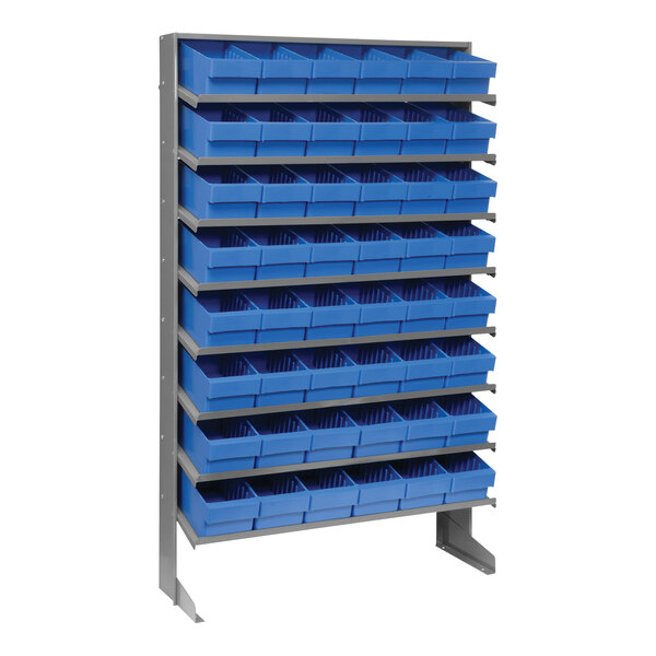A Quantum metal shelf rack with blue plastic bins on it.