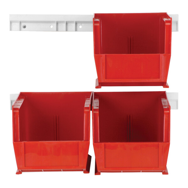 Two red Quantum plastic bins on white Quantum wall-mount shelves.