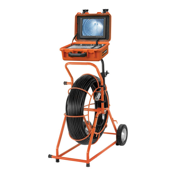 A laptop connected to a General Pipe Cleaners Gen-Eye video inspection system using an orange and black cable reel.