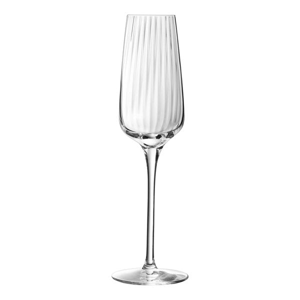 A close-up of a clear Chef & Sommelier flute wine glass with a thin stem.