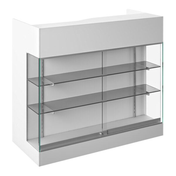 A white cash register counter with a locking white showcase with glass shelves.