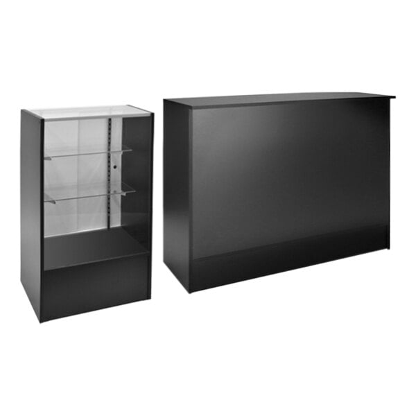 A black checkout set with a black counter and glass display shelves.