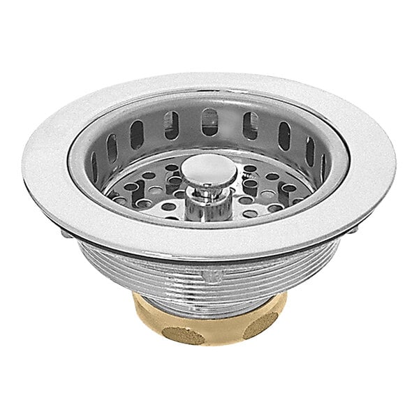 A Dearborn brass sink basket strainer with a locking cup installed in a sink drain.