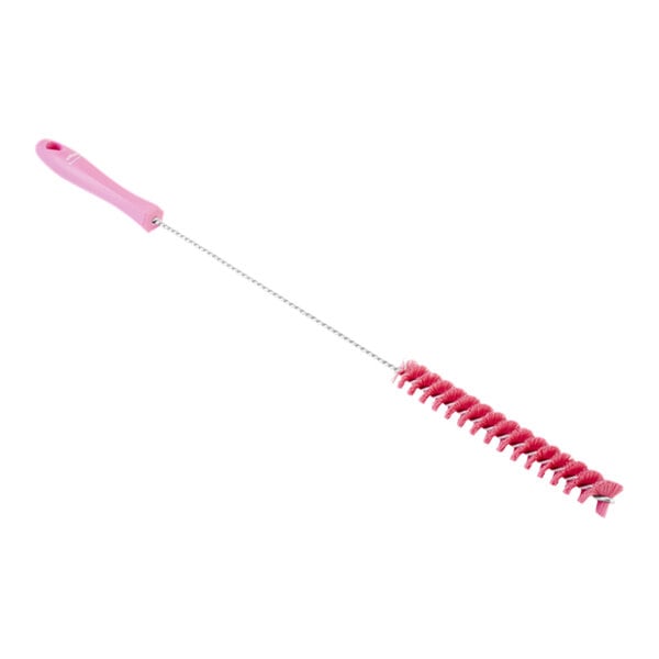A pink Vikan tube brush with a long handle.