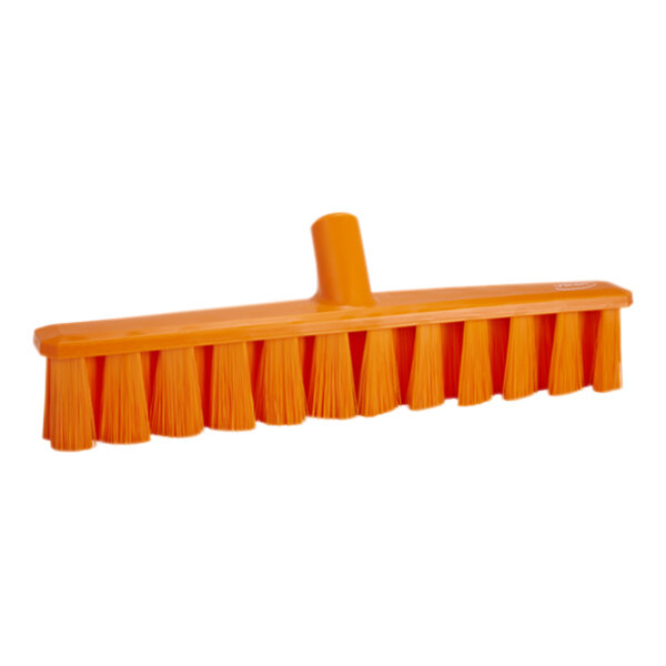 An orange broom head with medium bristles.