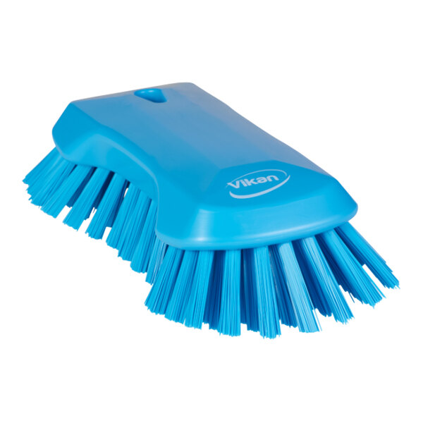 A blue Vikan scrub brush with extra stiff bristles.