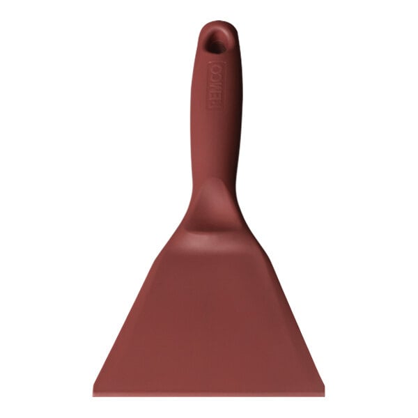 A close-up of a red Remco metal detectable polypropylene hand scraper with a handle.