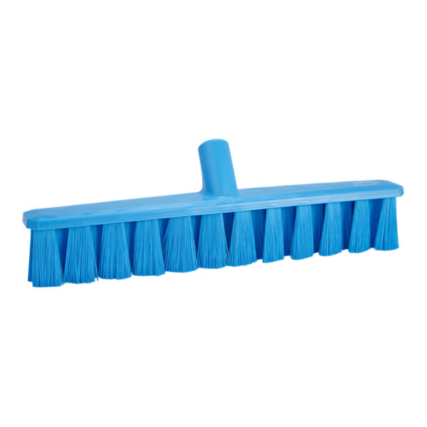 A blue plastic broom head with long soft bristles.