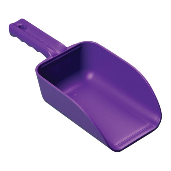 A purple plastic scoop with a handle.