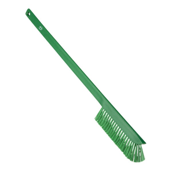 A green Vikan Ultra-Slim cleaning brush with a handle.